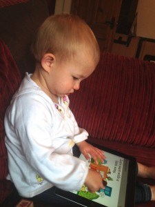 Happily enjoying her book!