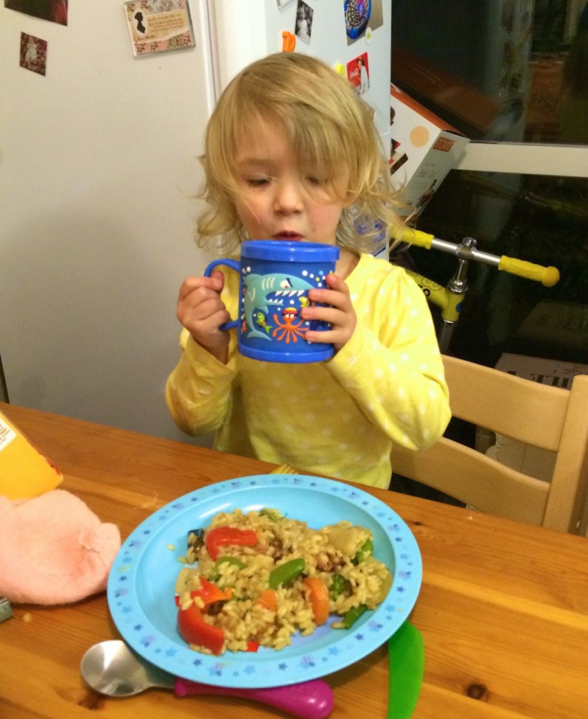 Having a drink with her big girl cup