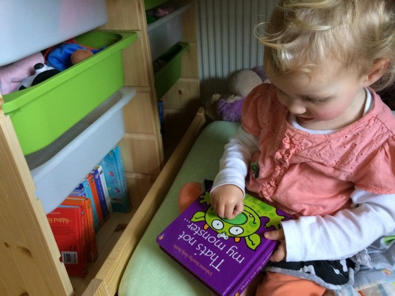 Reading books - kura bunkbed ikea hack