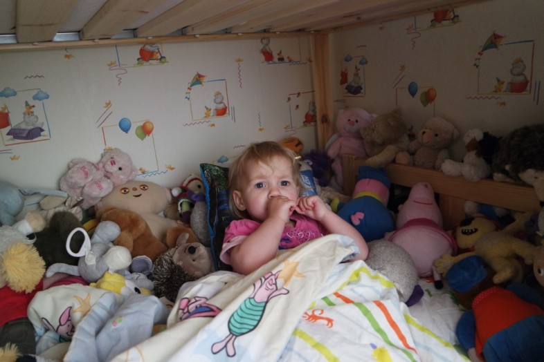 Lydia in her Kritter bed under the Kura