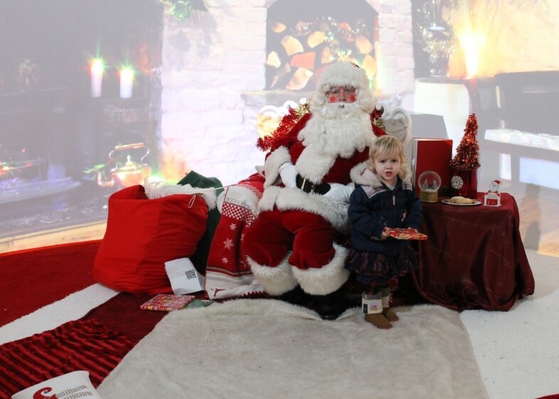 Lydia with Santa at Santa's Grotto, Bullring