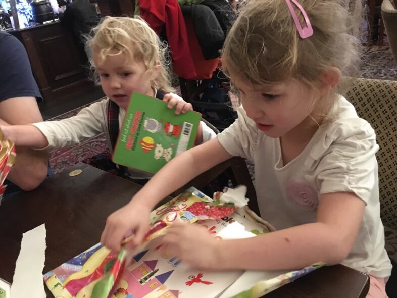 Georgie & Lydia open their presents from Santa's Grotto, Bullring