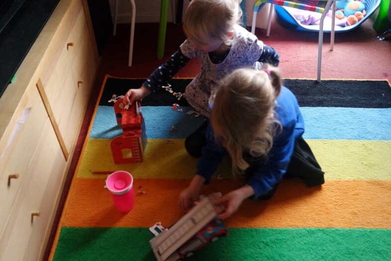 Georgie & Lydia playing with the Fire Engine