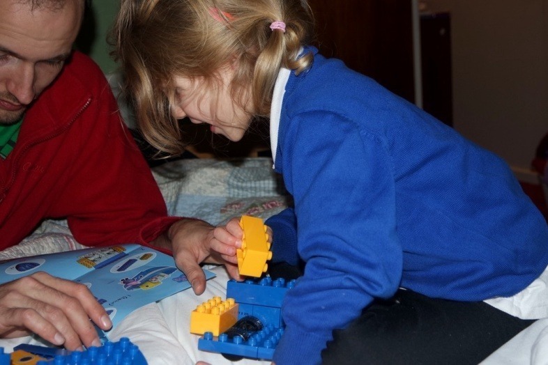 Georgie building the Peppa Pig Construction Grandpa Pig's Boat Set