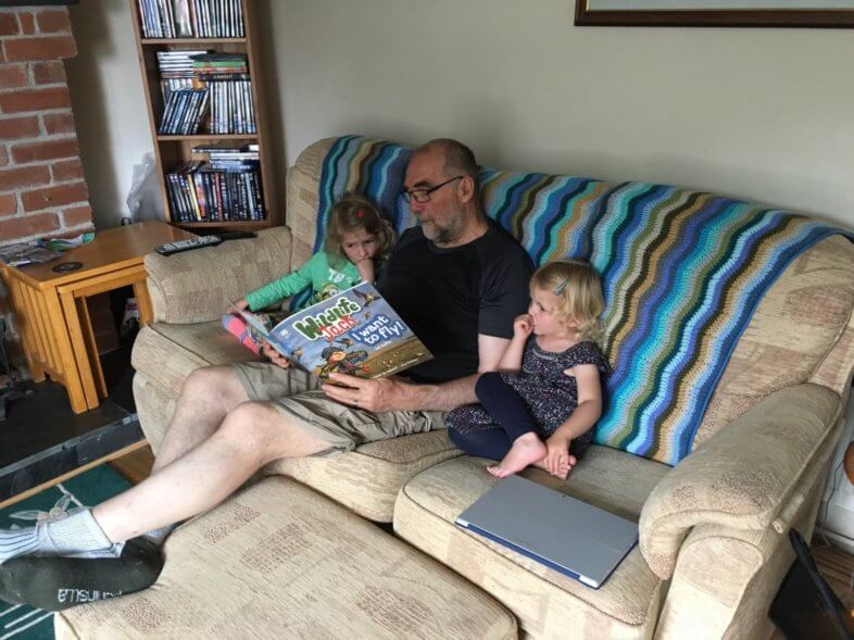 Dad reading to the girls
