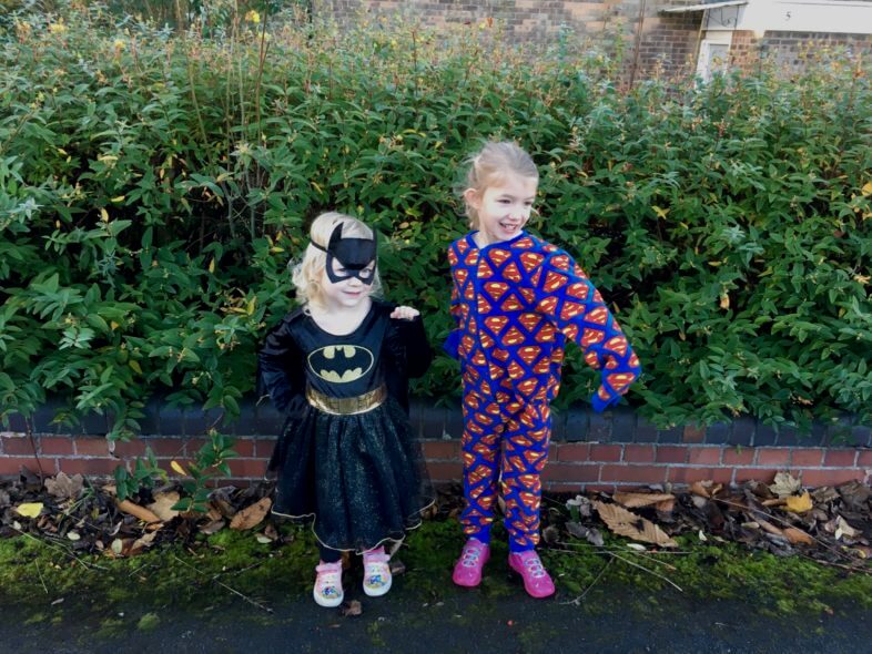 Batgirl and Supergirl
