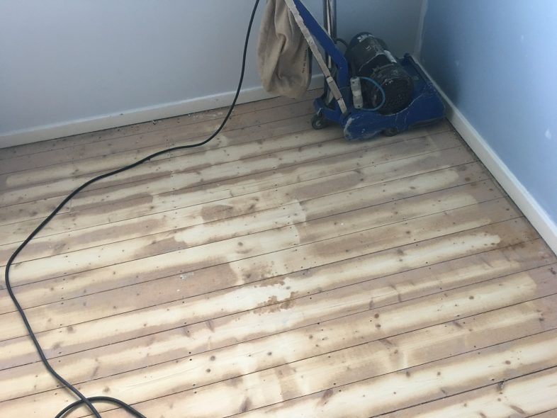 Sanding the floor
