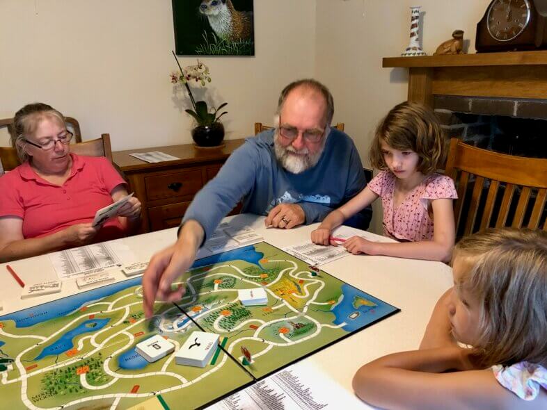 Georgie, Lydia and my parents playing a board game