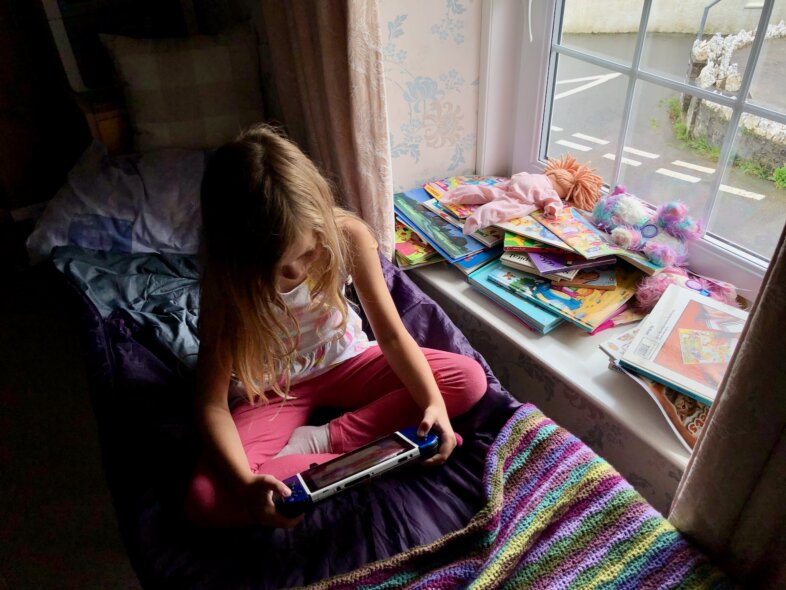 Lydia playing on the switch
